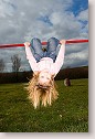 Little girl on the cross-bar