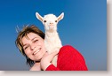 Woman with goatling